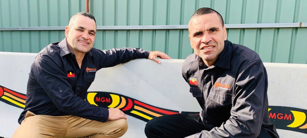 MGM team with Indigenous-branded concrete roadside barriers